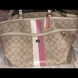 It’s a girl Coach diaper bag